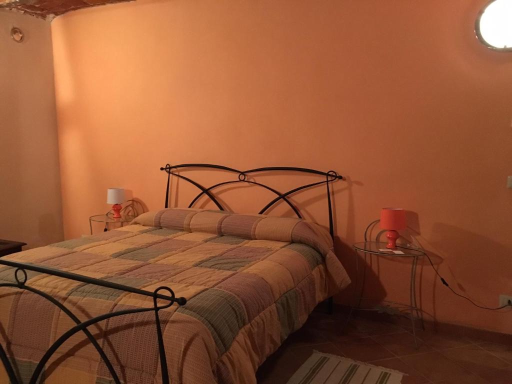 Postel nebo postele na pokoji v ubytování Il sogno di maggy