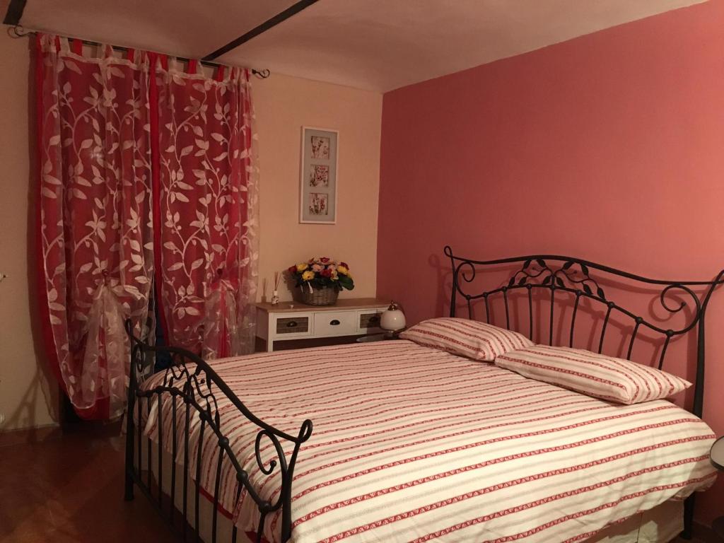 Postel nebo postele na pokoji v ubytování Il sogno di maggy