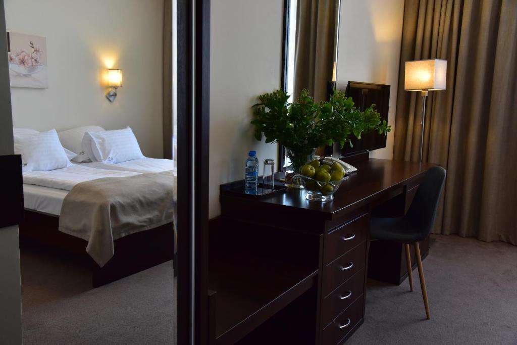 Postel nebo postele na pokoji v ubytování Hotel Hi-Fi Spa