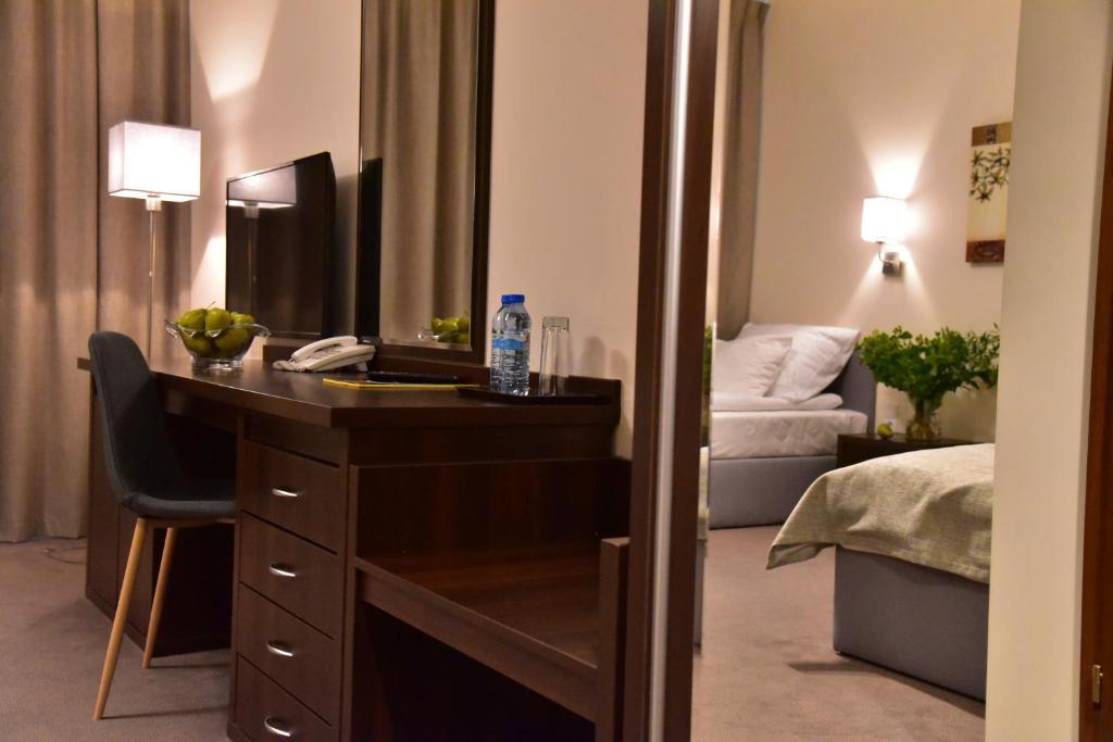 Postel nebo postele na pokoji v ubytování Hotel Hi-Fi Spa