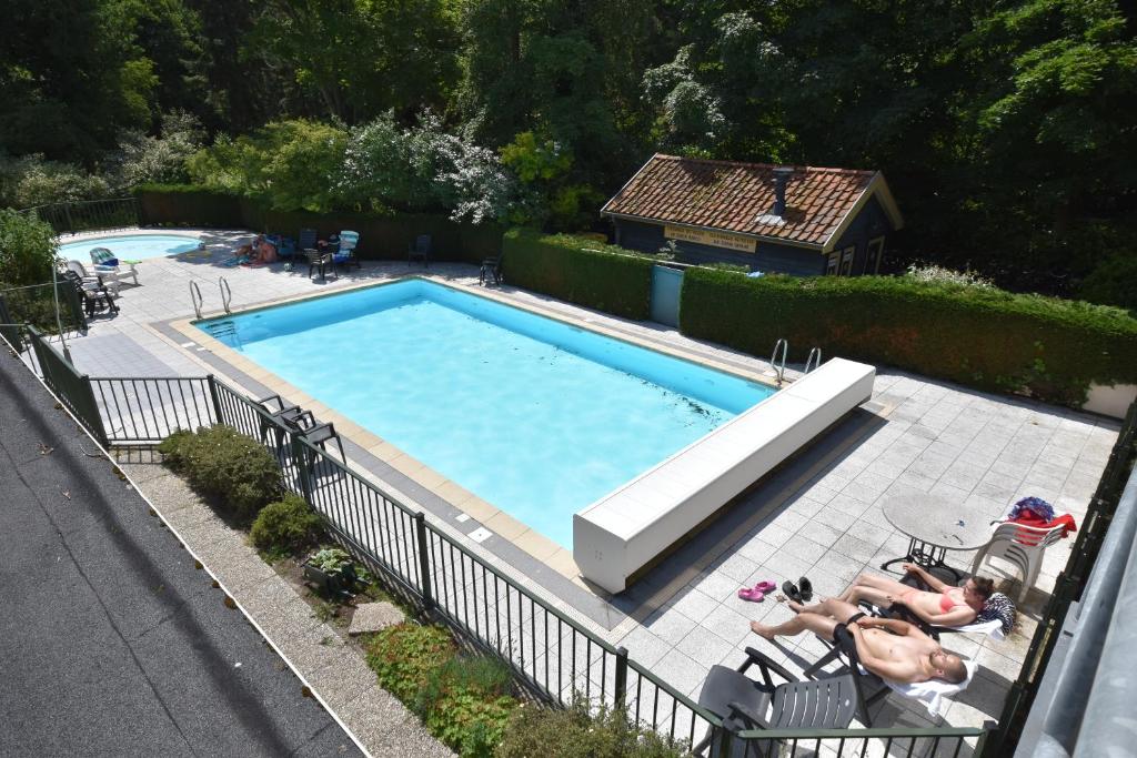 Bazén v ubytování Hotel De Torenhoeve nebo v jeho okolí