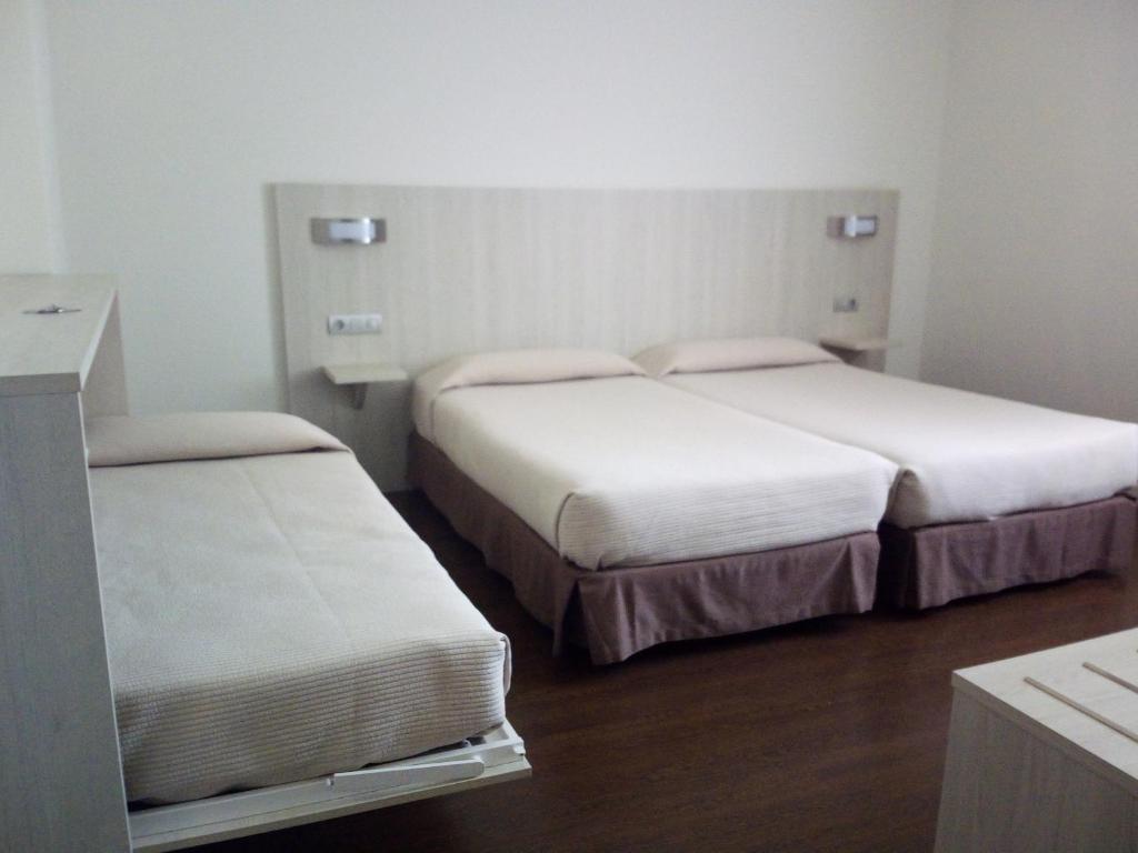 Postel nebo postele na pokoji v ubytování Hotel Seminario Aeropuerto Bilbao