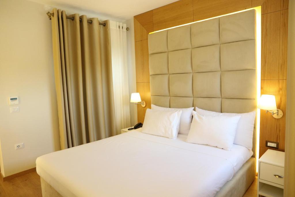 Postel nebo postele na pokoji v ubytování Vinea Resort