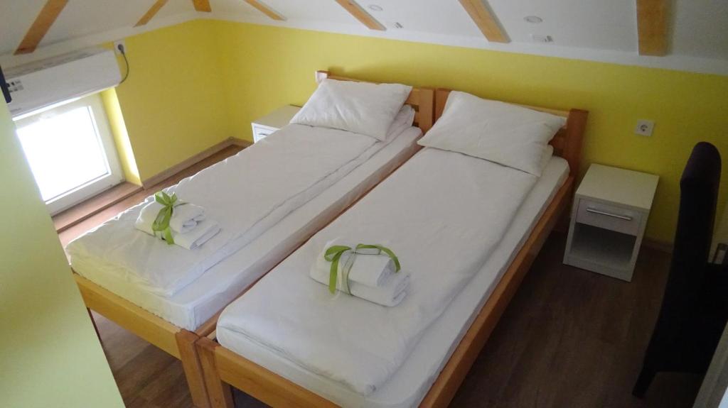 Postel nebo postele na pokoji v ubytování Apartmani Bojeresku Negotin
