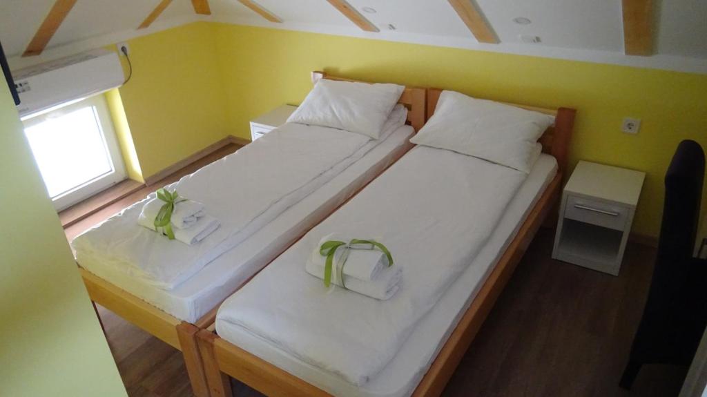 Postel nebo postele na pokoji v ubytování Apartmani Bojeresku Negotin