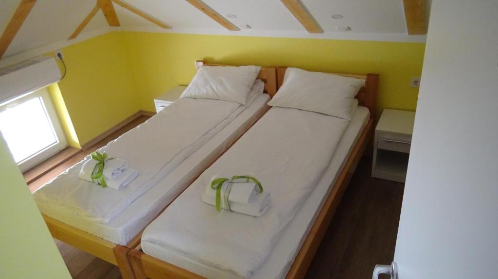Postel nebo postele na pokoji v ubytování Apartmani Bojeresku Negotin