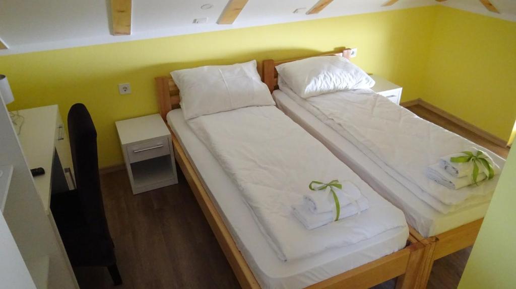 Postel nebo postele na pokoji v ubytování Apartmani Bojeresku Negotin