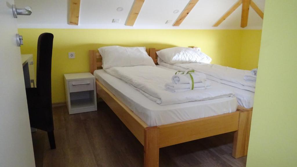 Postel nebo postele na pokoji v ubytování Apartmani Bojeresku Negotin