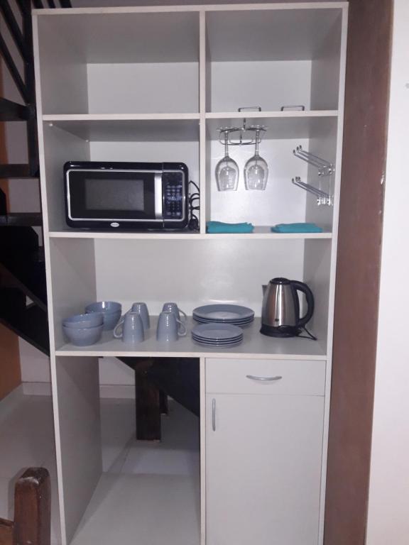 Kuchyň nebo kuchyňský kout v ubytování Hotel Casa Jardin
