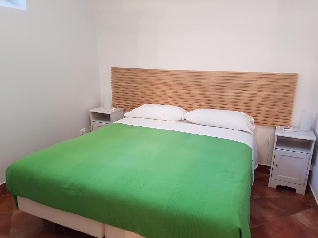 Łóżko lub łóżka w pokoju w obiekcie Iblea Paradise