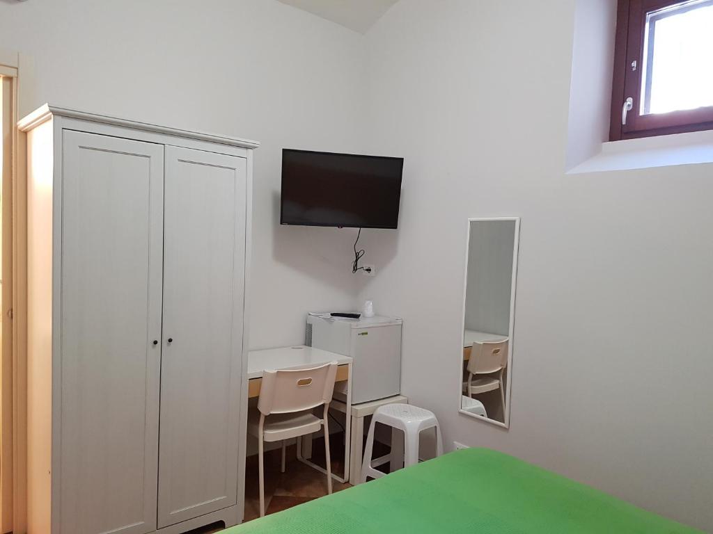 Telewizja i/lub zestaw kina domowego w obiekcie Iblea Paradise