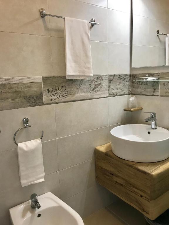 Koupelna v ubytování Albergo Moderno