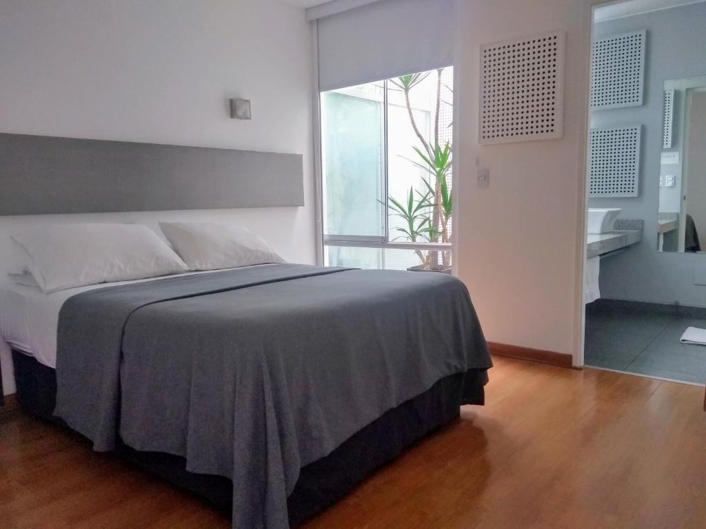 Postel nebo postele na pokoji v ubytování 3B Barranco by Katari Hoteles