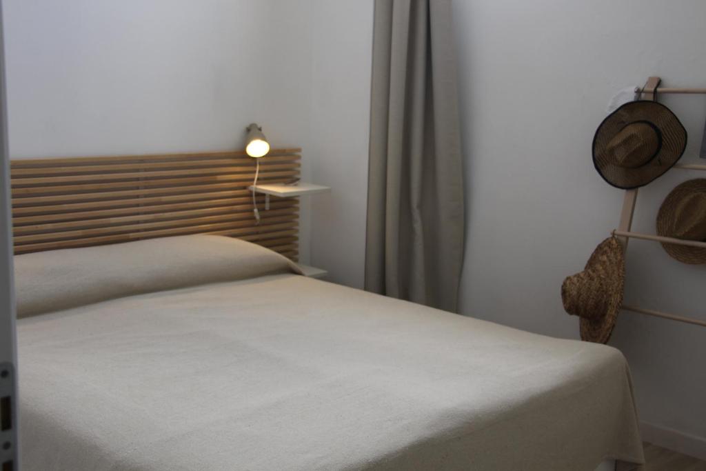 A bed or beds in a room at Lanterna sul mare