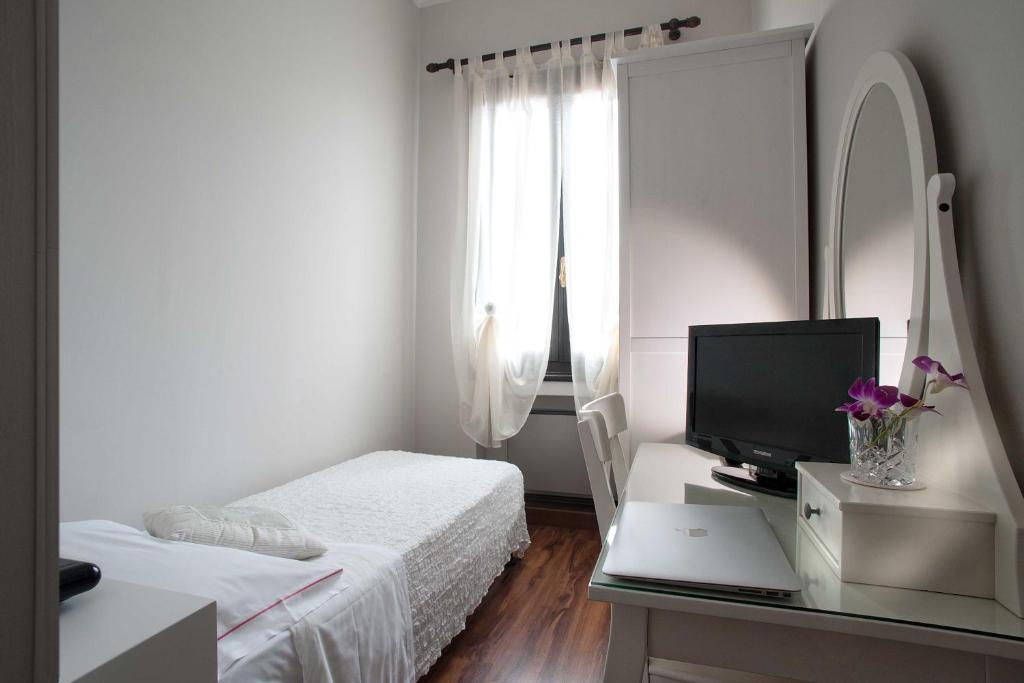 Postel nebo postele na pokoji v ubytování Hotel Al Castello