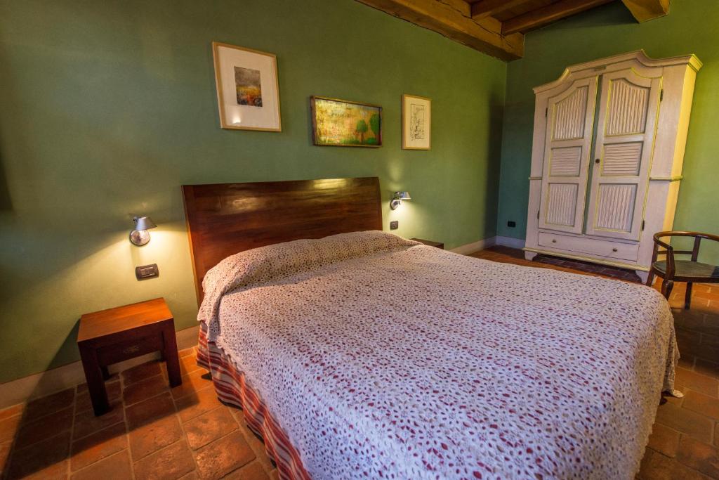 Postel nebo postele na pokoji v ubytování Albergo Ristorante Garibaldi