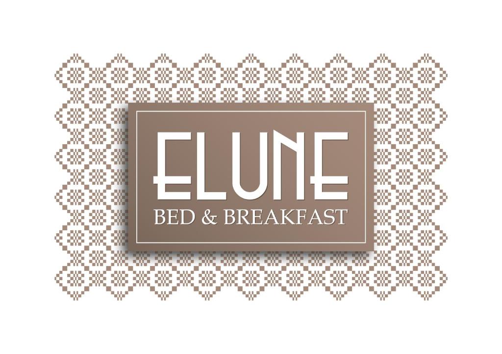 Postel nebo postele na pokoji v ubytování Elune B&B