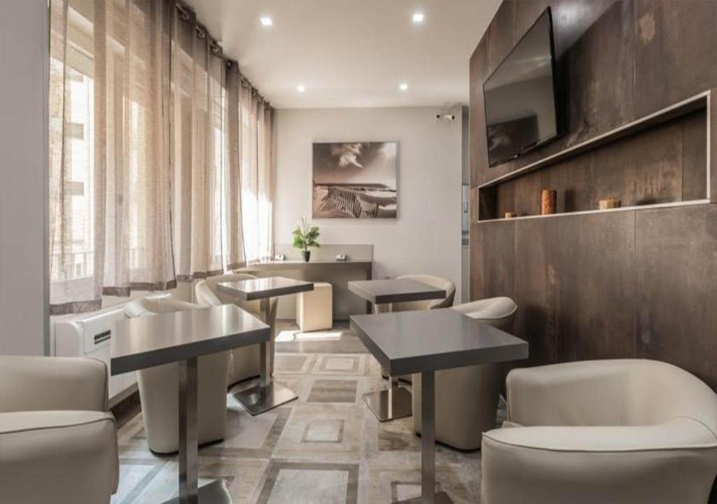 A seating area at Astoria Deluxe rooms