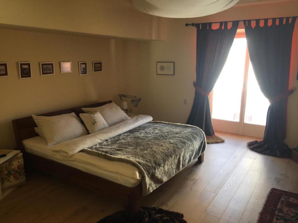 Ένα ή περισσότερα κρεβάτια σε δωμάτιο στο Villa Carla