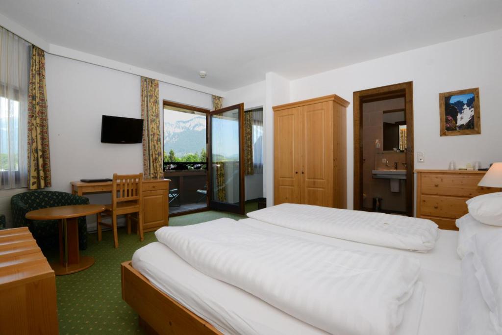 Postel nebo postele na pokoji v ubytování Hotel Park