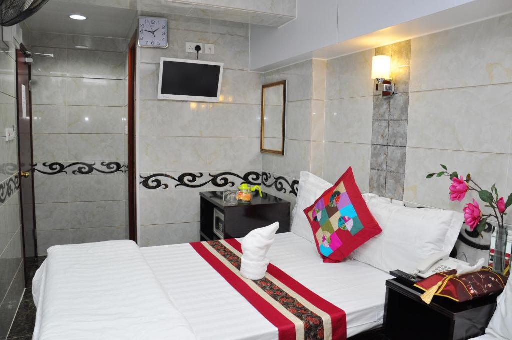 Postel nebo postele na pokoji v ubytování Pearl Premium Guest House(10/F)