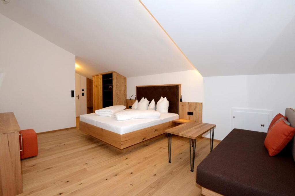 Postel nebo postele na pokoji v ubytování Hotel Park