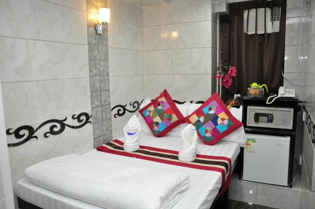 Postel nebo postele na pokoji v ubytování Pearl Premium Guest House(10/F)