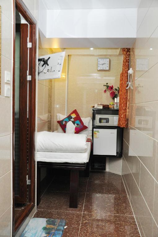 Postel nebo postele na pokoji v ubytování Pearl Premium Guest House(10/F)