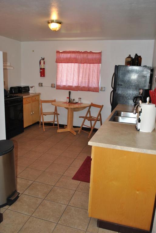 Kuchyň nebo kuchyňský kout v ubytování Aspen Inn
