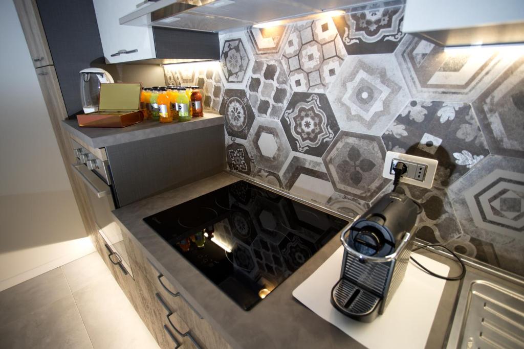 Kuchyň nebo kuchyňský kout v ubytování Casa Elisa Dimora Urbana