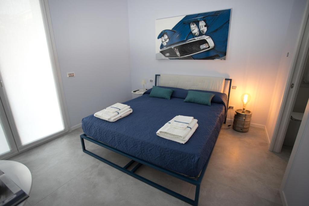 Postel nebo postele na pokoji v ubytování Casa Elisa Dimora Urbana