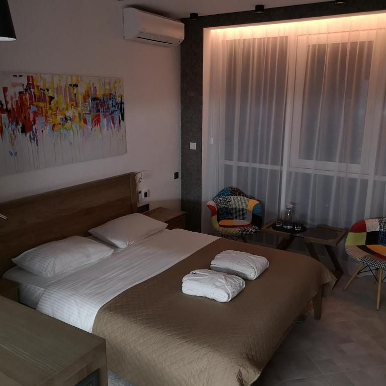 Postel nebo postele na pokoji v ubytování ACCOMMODO192