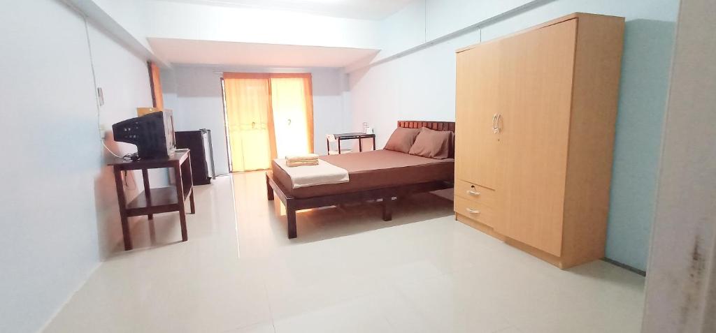 Postel nebo postele na pokoji v ubytování Banyan Resort Bangsaen