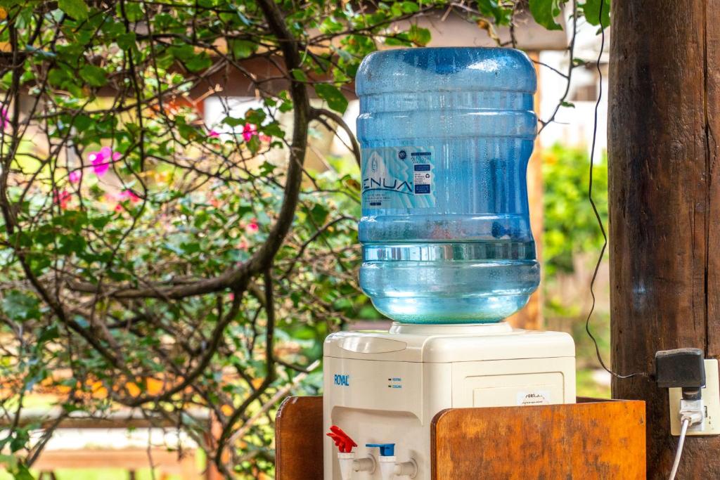 a large blue water bottle sitting on top of a machine at Inaki Uhi Hotel in Hanga Roa