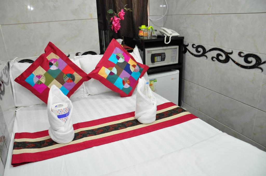 Postel nebo postele na pokoji v ubytování Pearl Premium Guest House(10/F)