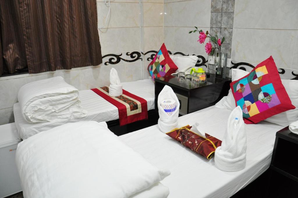 Postel nebo postele na pokoji v ubytování Pearl Premium Guest House(10/F)