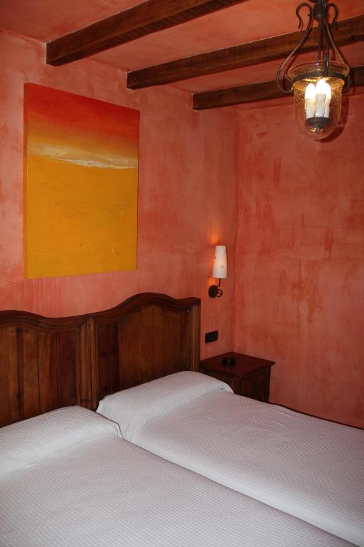 Postel nebo postele na pokoji v ubytování Posada Calera