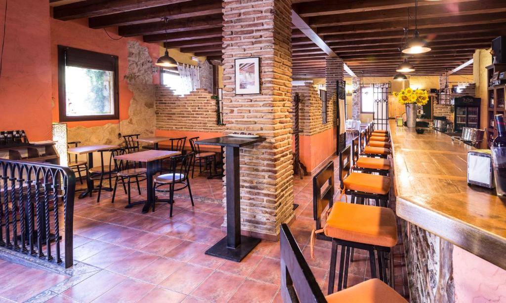 Reštaurácia alebo iné gastronomické zariadenie v ubytovaní El Rincón de las Hoces del Duratón