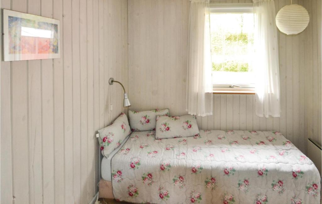 Postel nebo postele na pokoji v ubytování Holiday Home Bogfinkevej Ørsted Xi