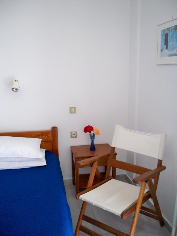 Postel nebo postele na pokoji v ubytování Heracles Hotel
