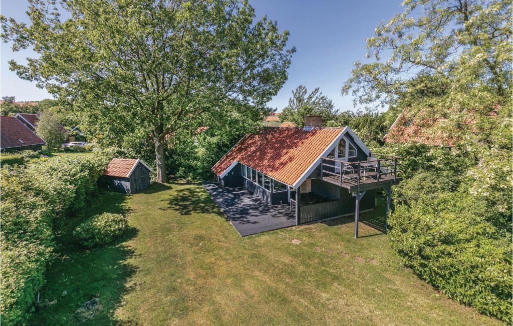 an overhead view of a house with a roof at 3 Bedroom Cozy Home In Gudhjem in Gudhjem