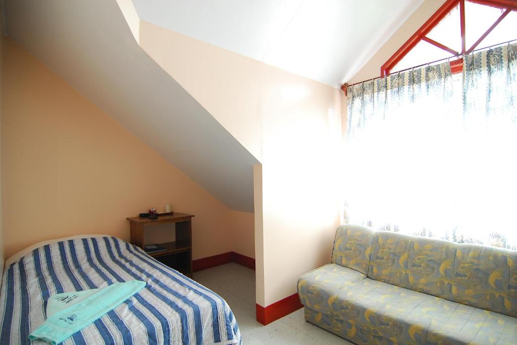 Postel nebo postele na pokoji v ubytování ANTELOPE GUESTHOUSE