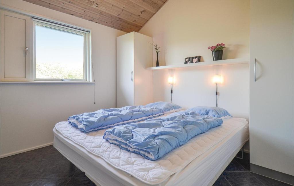 Postel nebo postele na pokoji v ubytování Holiday Home Metholmvej