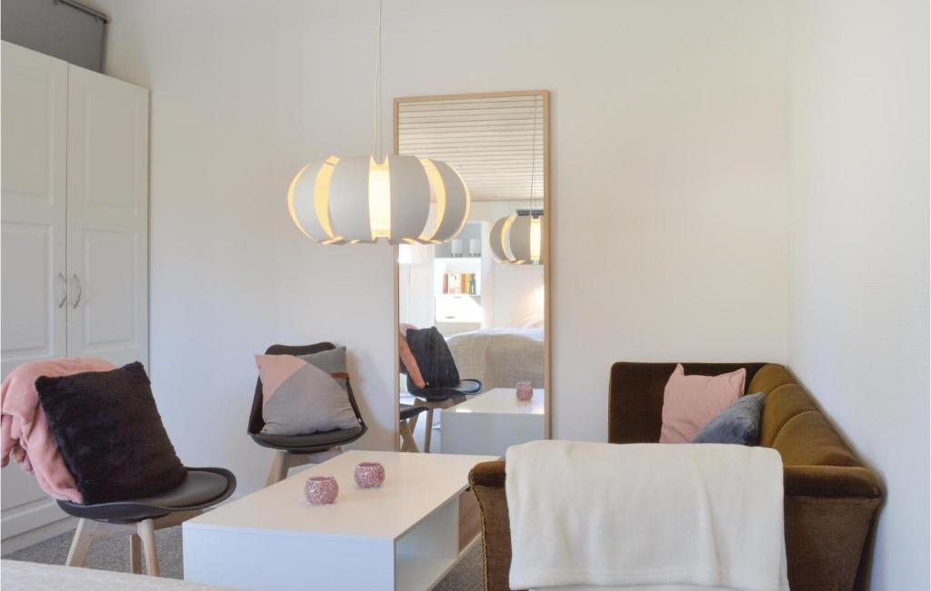 Posezení v ubytování Three-Bedroom Holiday Home In Jagerspris