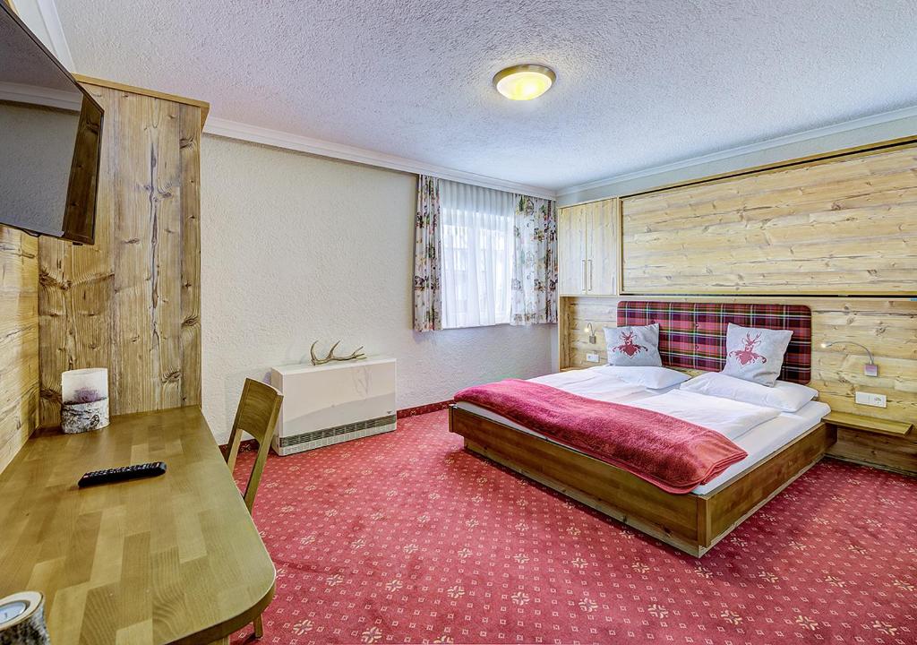 Postel nebo postele na pokoji v ubytování Mountainlovers Berghotel SeidlAlm