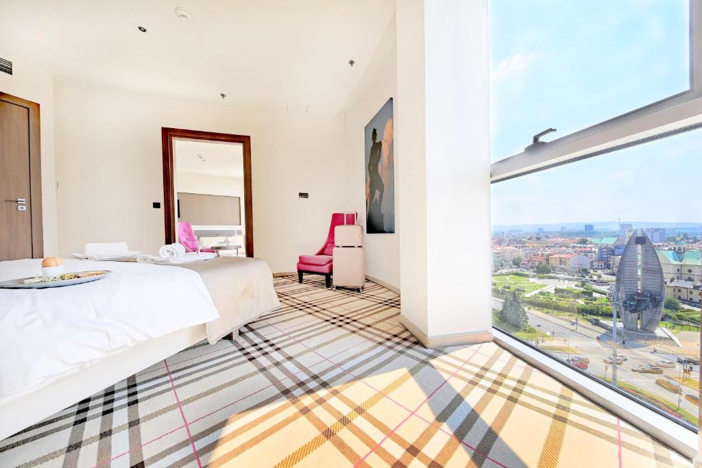 Postel nebo postele na pokoji v ubytování Hotel Rzeszów