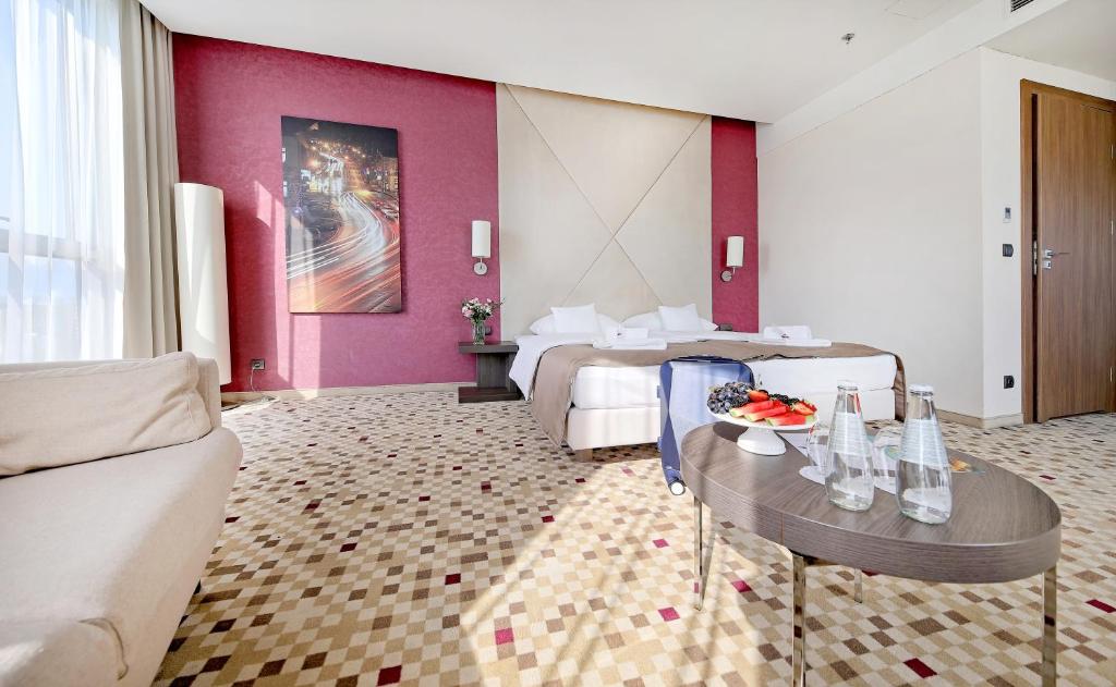 Postel nebo postele na pokoji v ubytování Hotel Rzeszów