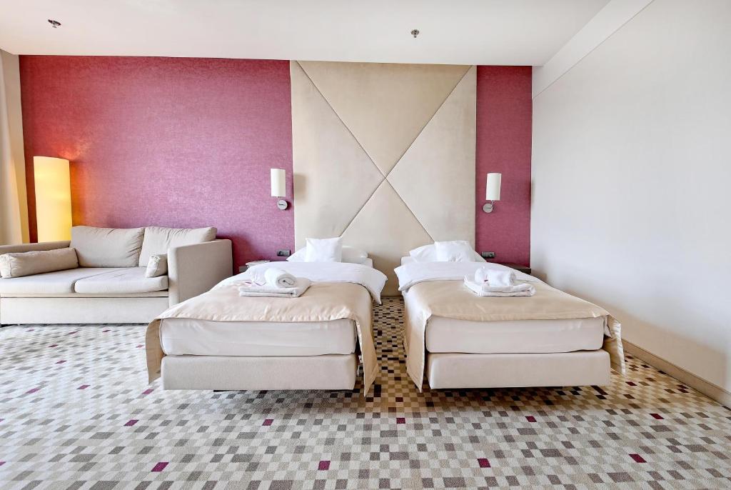 Postel nebo postele na pokoji v ubytování Hotel Rzeszów
