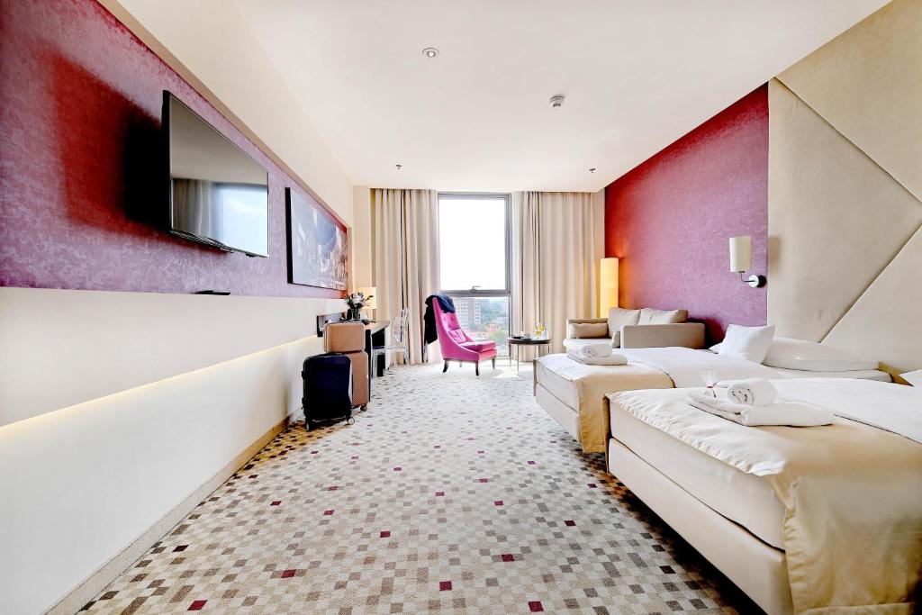 TV a/nebo společenská místnost v ubytování Hotel Rzeszów