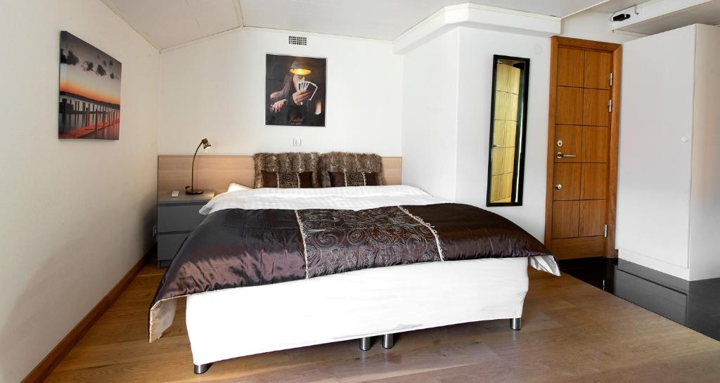 Postel nebo postele na pokoji v ubytování City HotelApartment